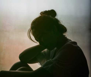 Silhouette of depressed woman 